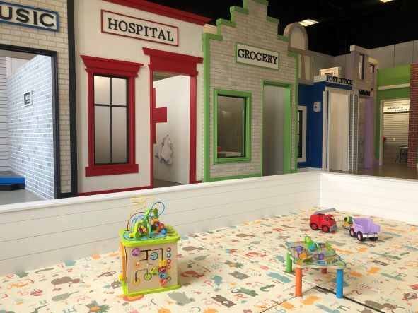 minisota play cafe with play mat and different themed rooms
