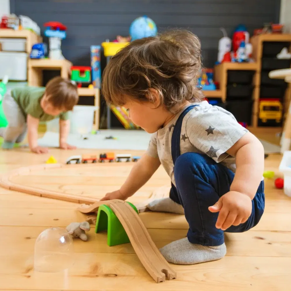 A child playing with a ramp at a Little Newtons daycare